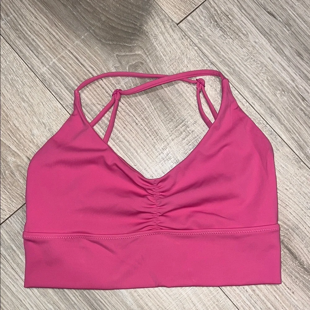 Princess Polly pink sports bra